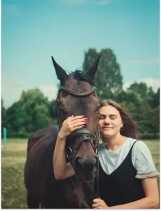 girl bonding with horse